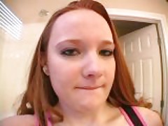 Blue eyed redhead teen Halo showing her pierced nipples